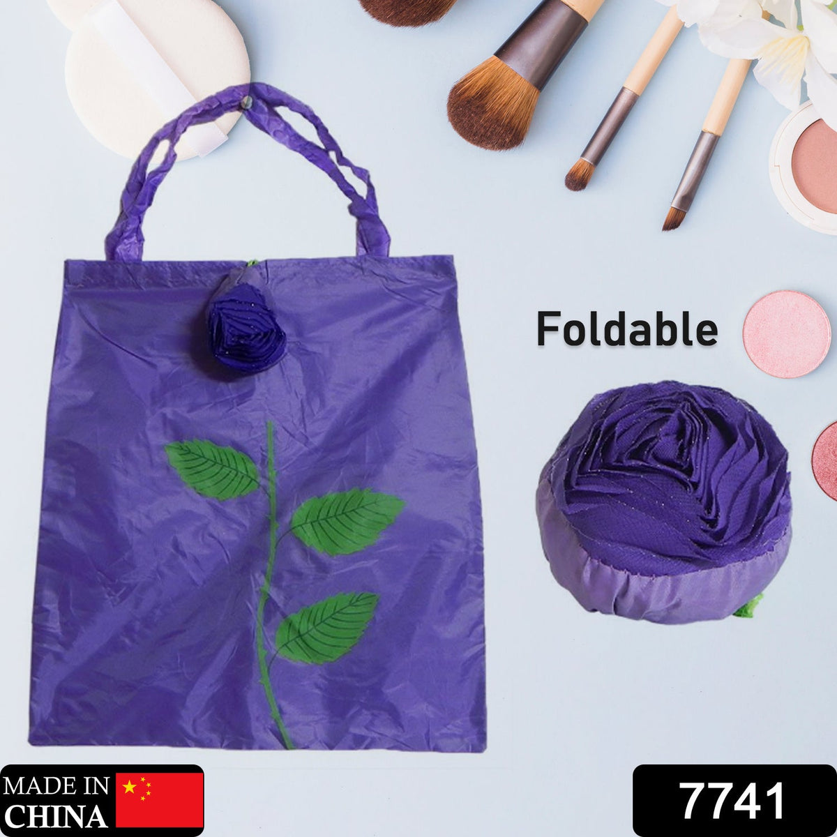 A purple foldable shopping bag with a rose design is displayed next to the bag folded into a rose shape.