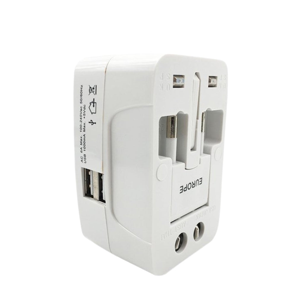 Angled view of the white universal travel adapter, showing its various ports and retractable pins.