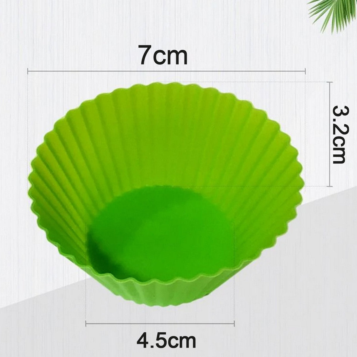 A green silicone cupcake mold is shown with dimensions: 7cm diameter, 3.2cm height, 4.5cm base.