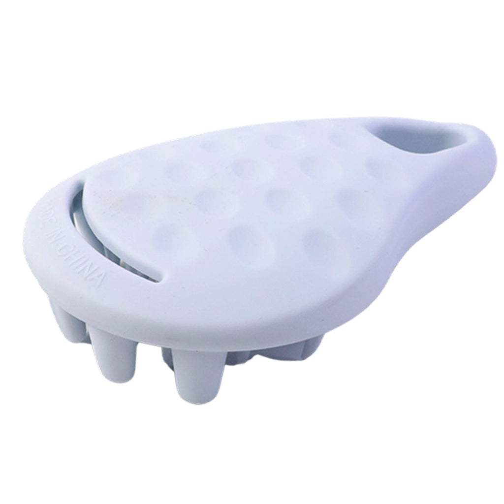 A light blue silicone scalp massager with a textured top and four large nubs on the bottom.
