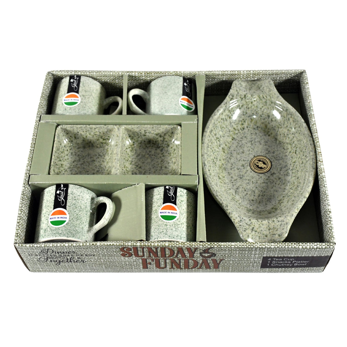A speckled gray-green ceramic snack and tea set in an open gift box with text.