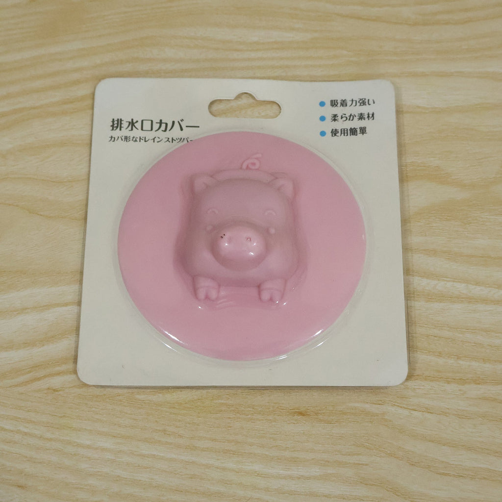 Silicone drain cover in its retail card packing, ready for purchase.