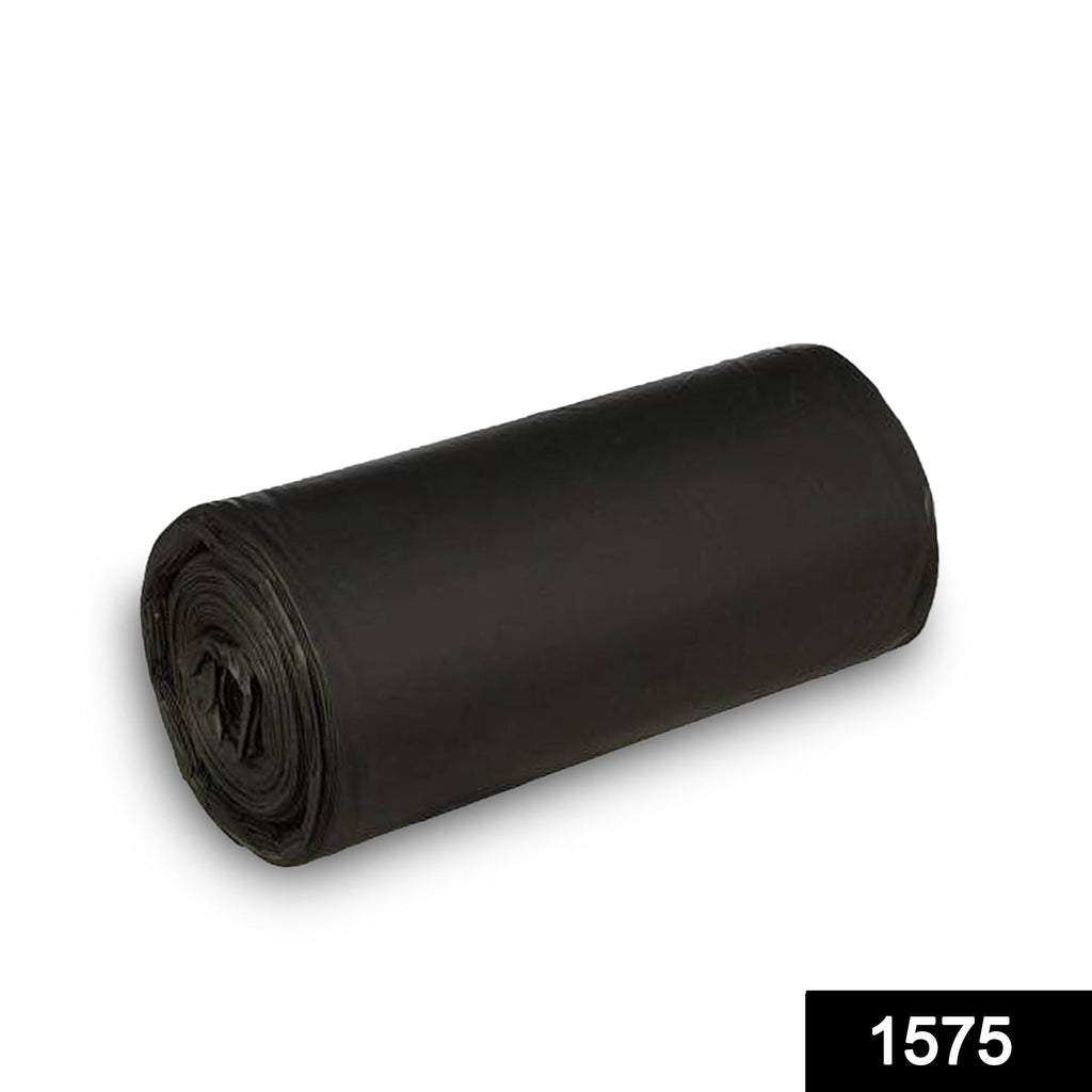 A single roll of black garbage bags lies diagonally on a white background with a shadow.