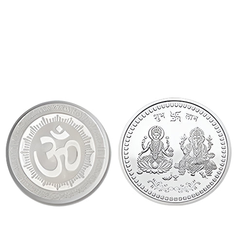 Two silver coins, one with an Om symbol and the other with Lakshmi and Ganesha, on a white background.