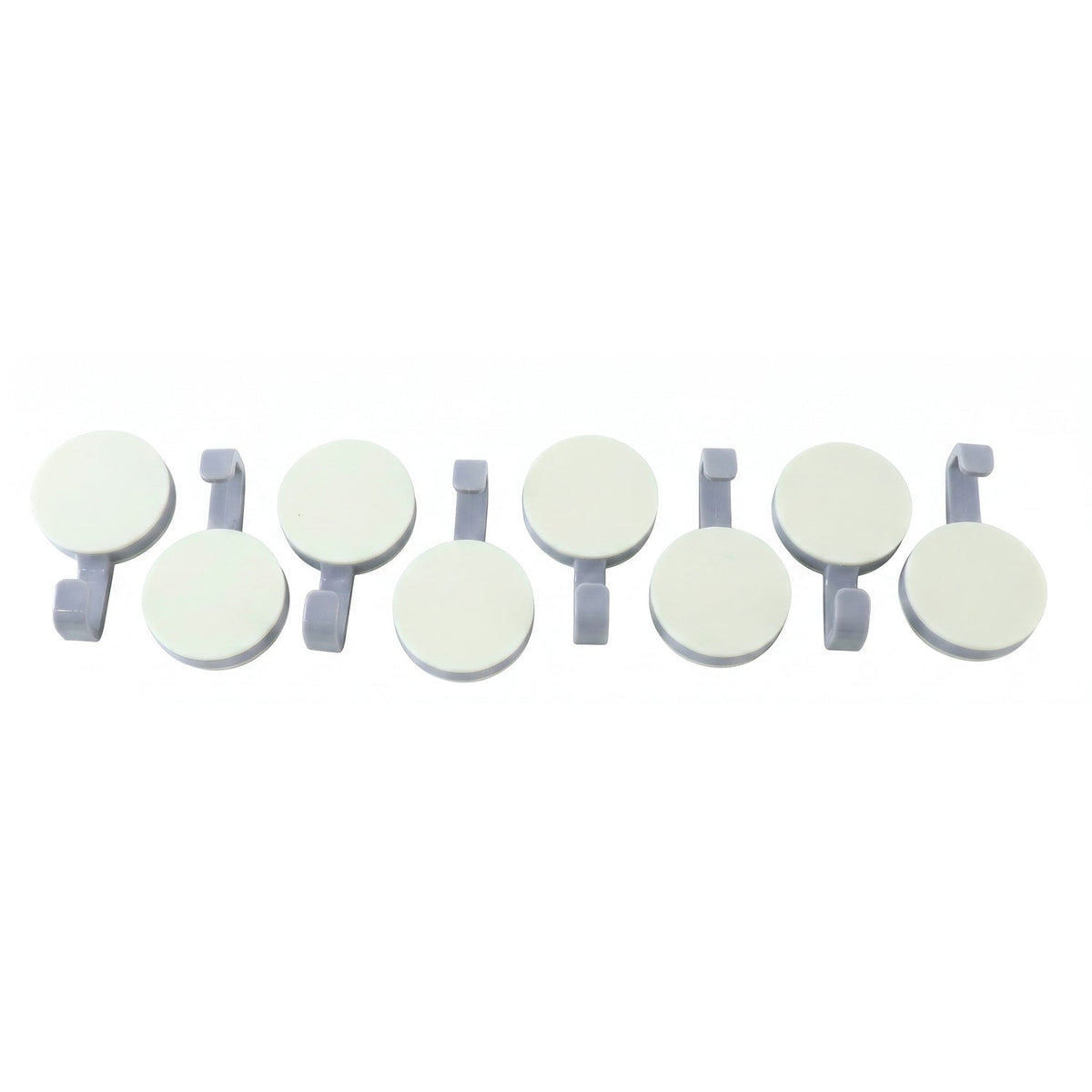 Adhesive wall hooks on white background