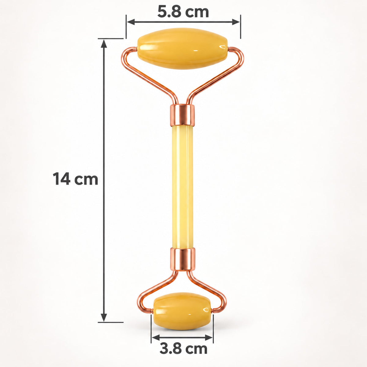 A yellow facial roller with rose gold accents is shown with its dimensions of 14 cm length and roller widths.