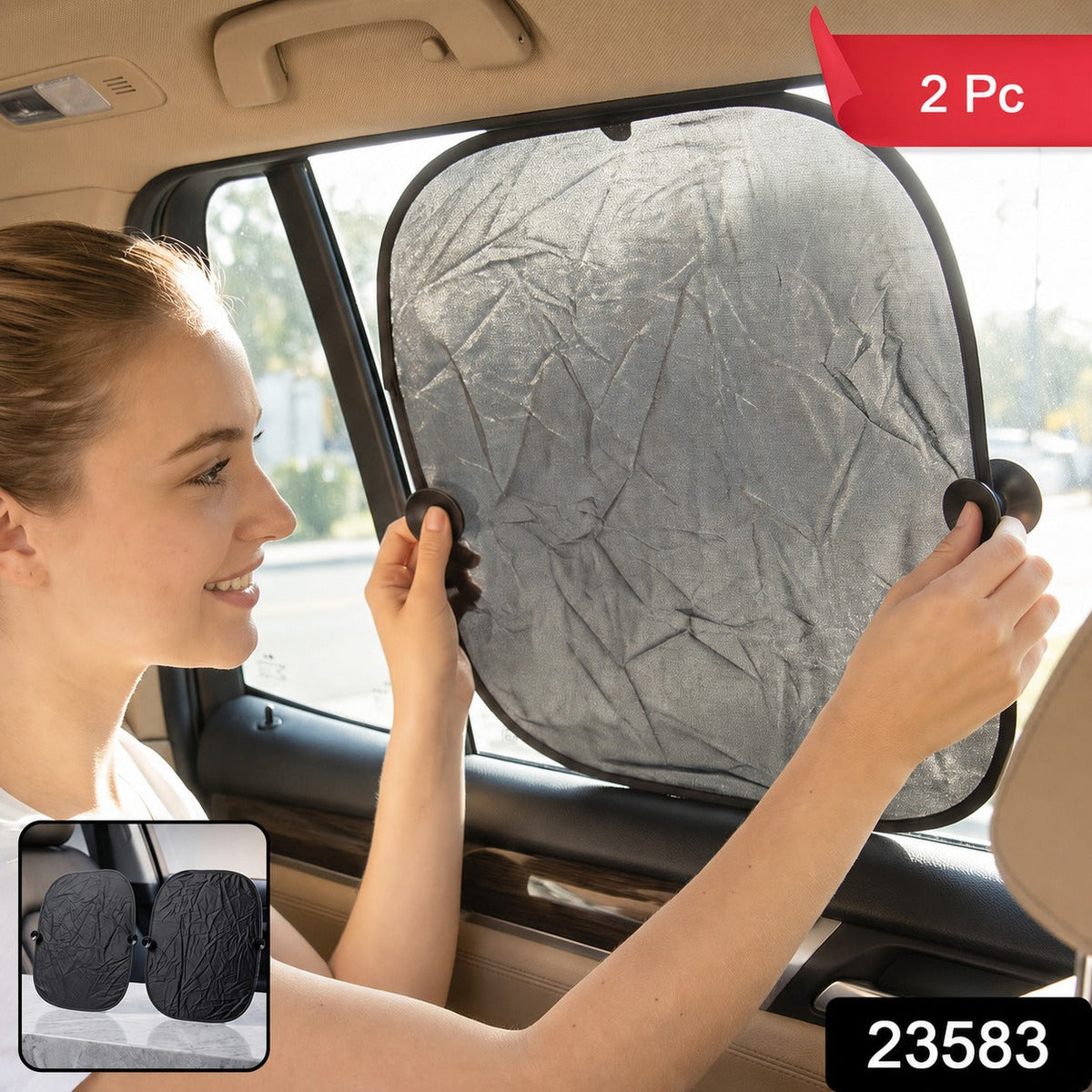 A woman installs a black foldable sunshade with suction cups on a car's side window, with a small inset showing two – view 2