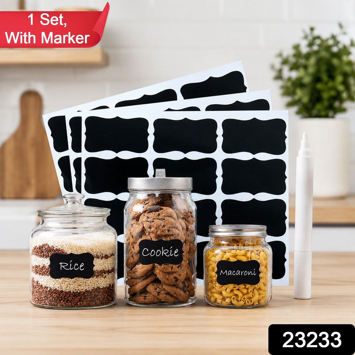 Three glass jars with chalkboard labels for rice, cookies, and macaroni, with blank labels and a white marker, with a red
