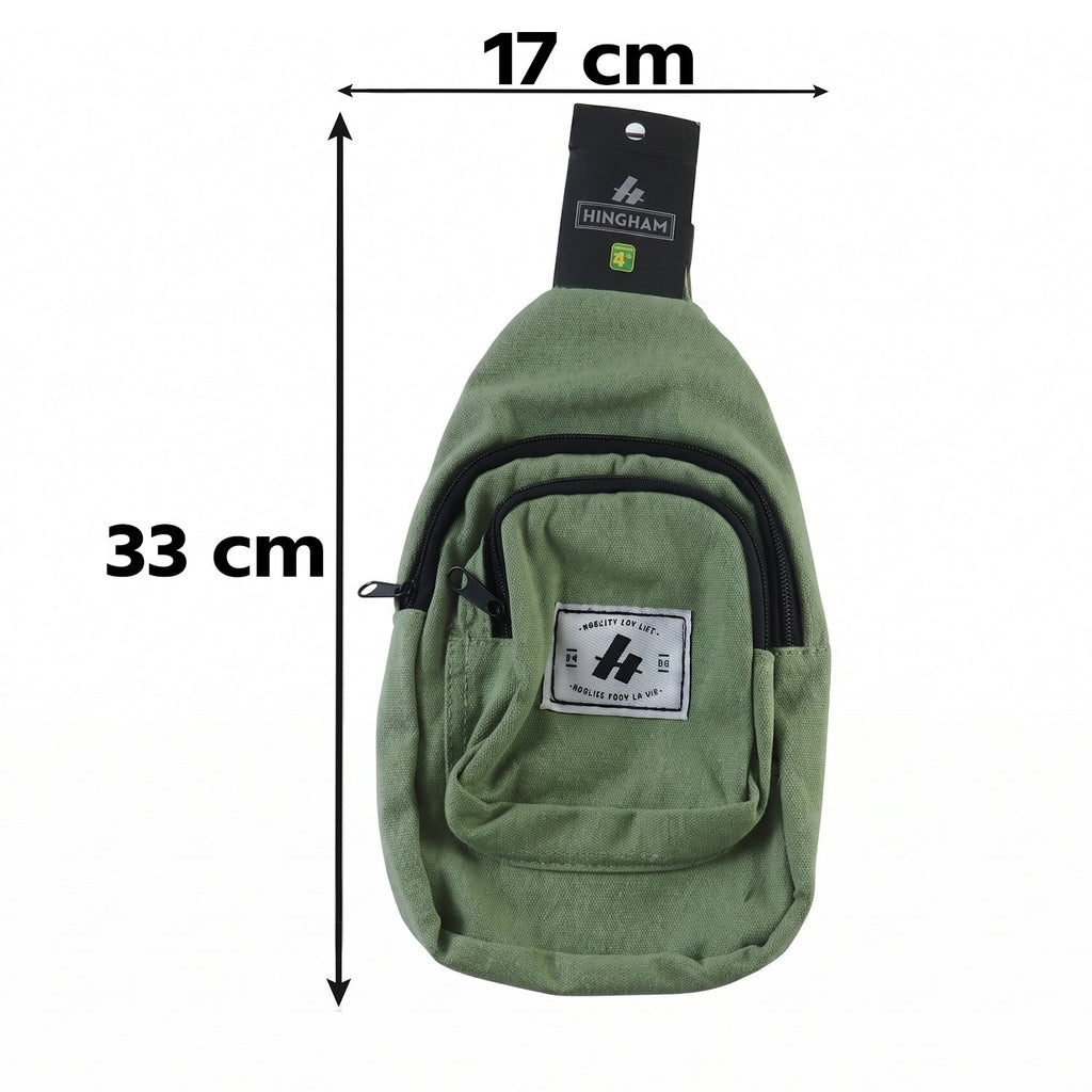 A green canvas sling bag with a front pocket and black strap is shown with dimensions of 33 cm by 17 cm.