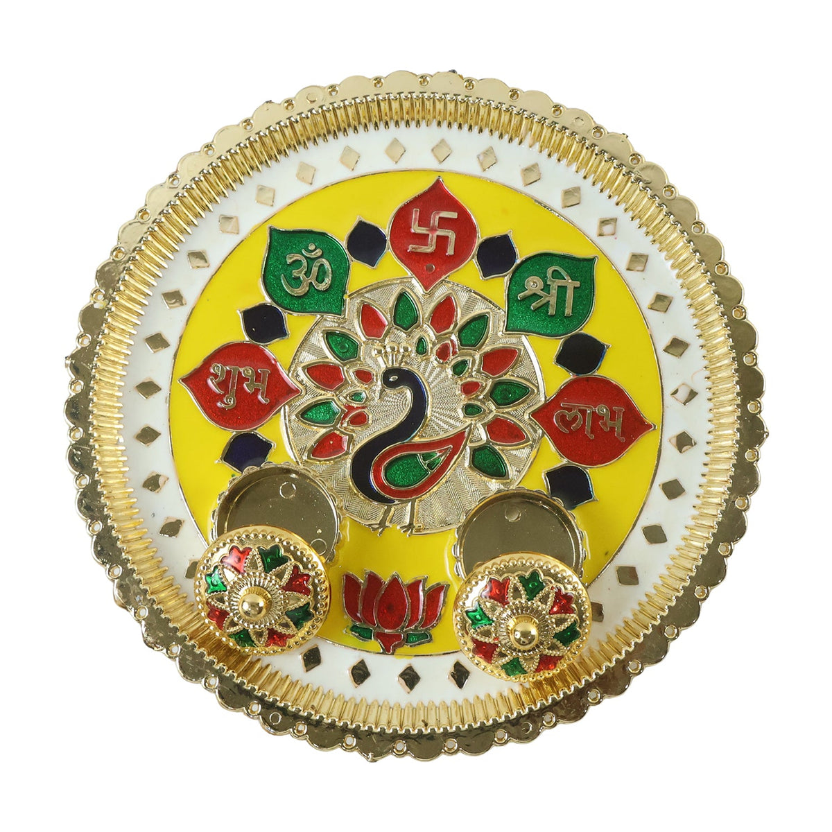 A golden pooja thali with a peacock design and two empty small bowls on a white background.