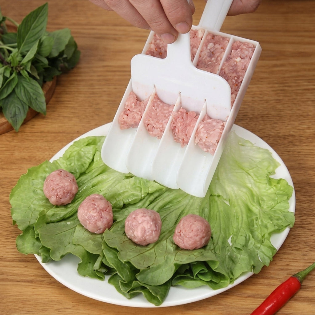 A person uses a white plastic meatball maker to scoop raw ground meat onto a bed of green lettuce on a white plate.