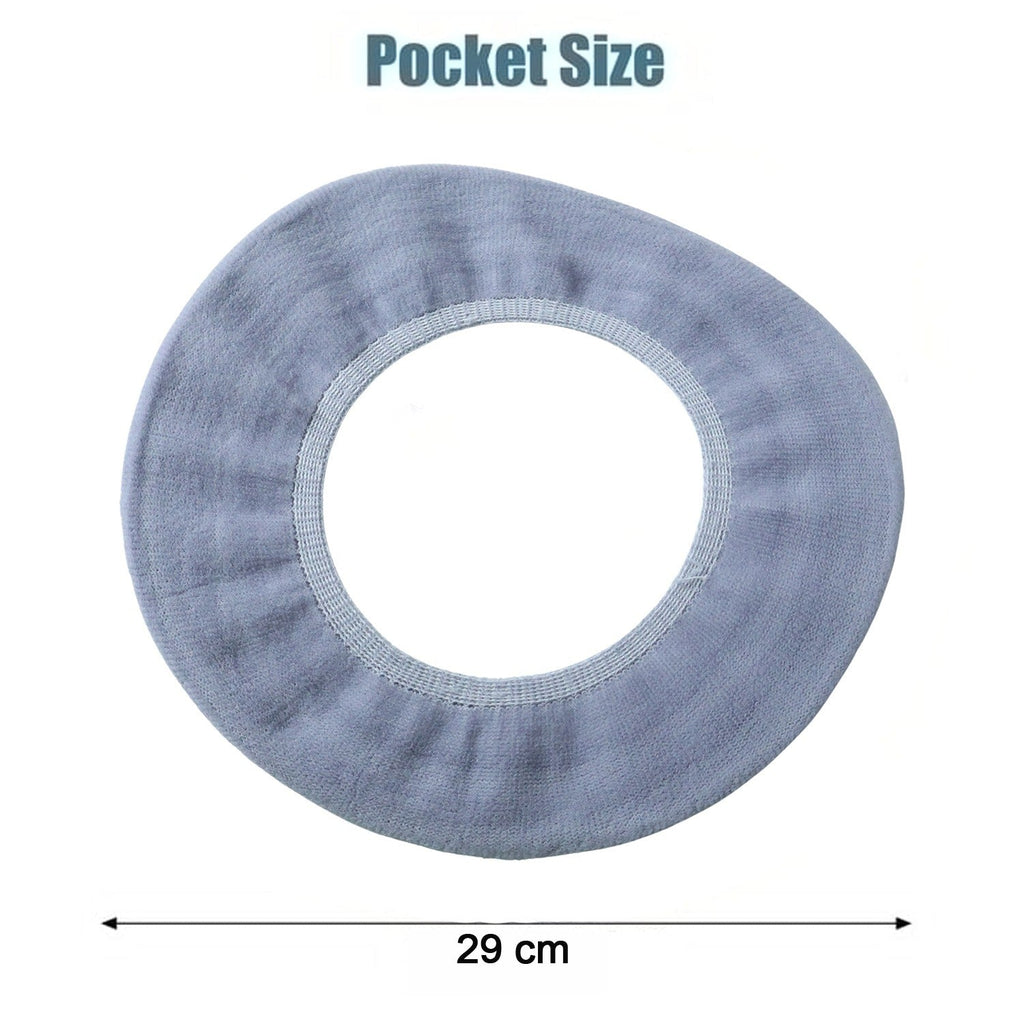 A light blue-grey elastic toilet seat cover with a 29 cm measurement indicated by arrows below it.