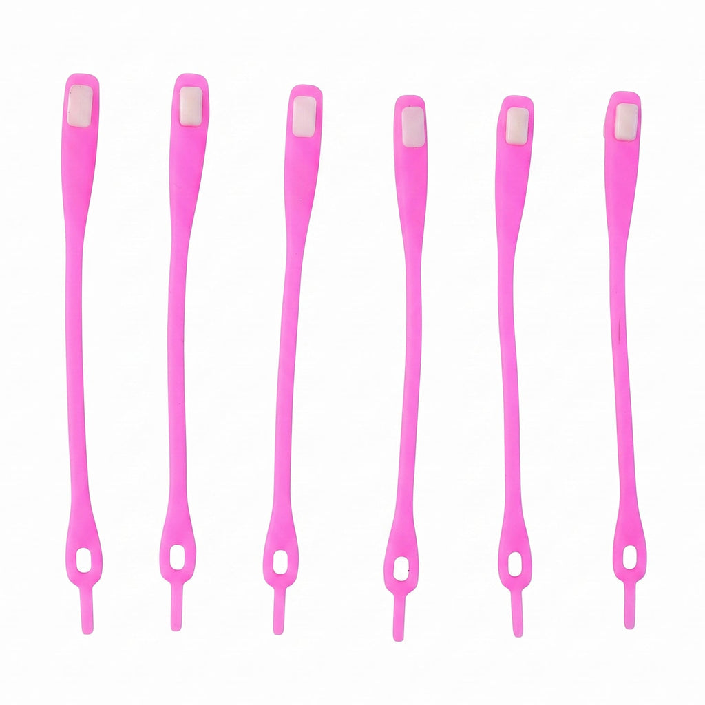 Six individual bright pink silicone no-tie shoelaces with white clasps, arranged vertically on a white background.