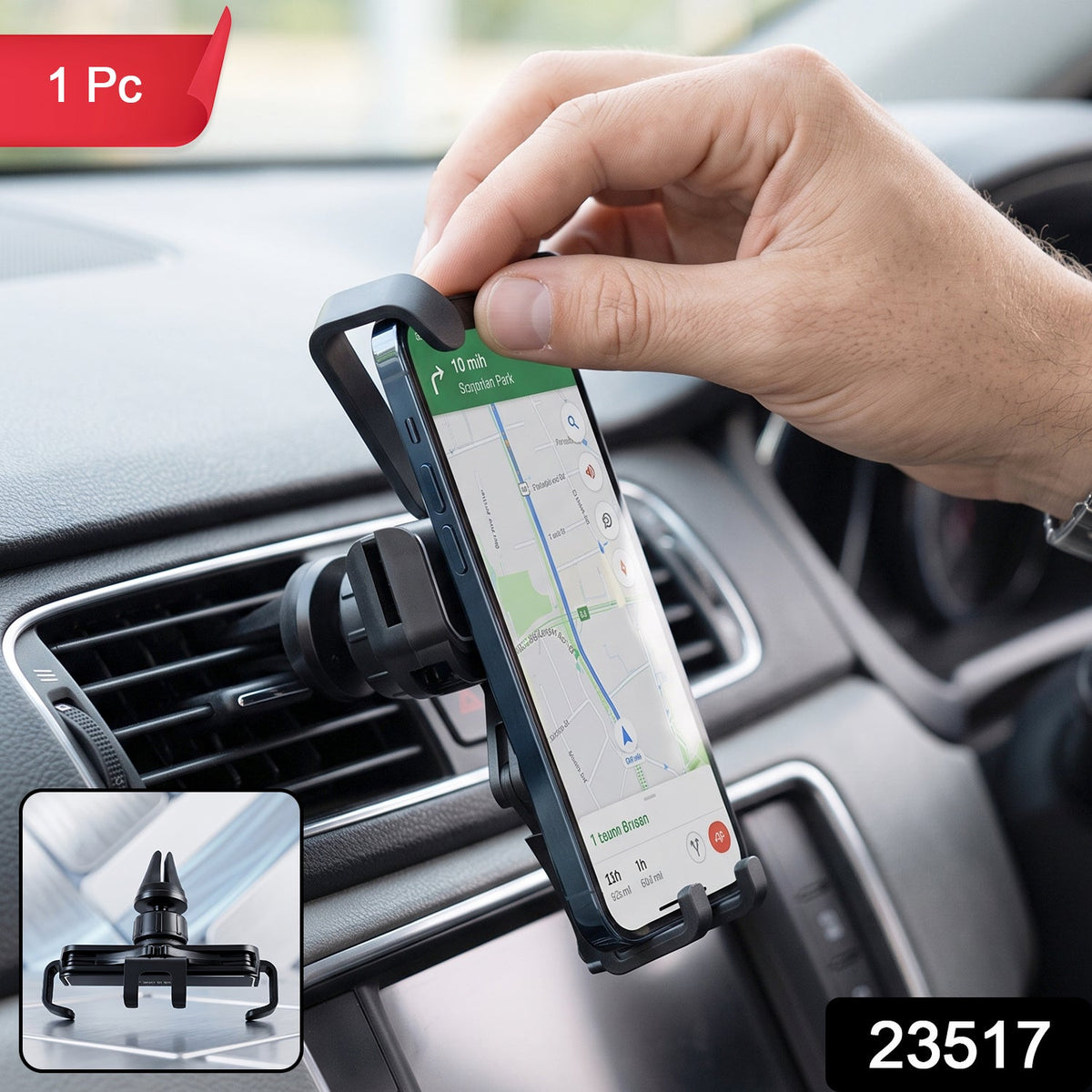 A hand placing a smartphone with a map on its screen into a black car air vent phone holder, with '1 Pc' and '23517' labels.